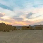Sunset view of the desert museum and domes at Wadi El Hitan, Egypt.