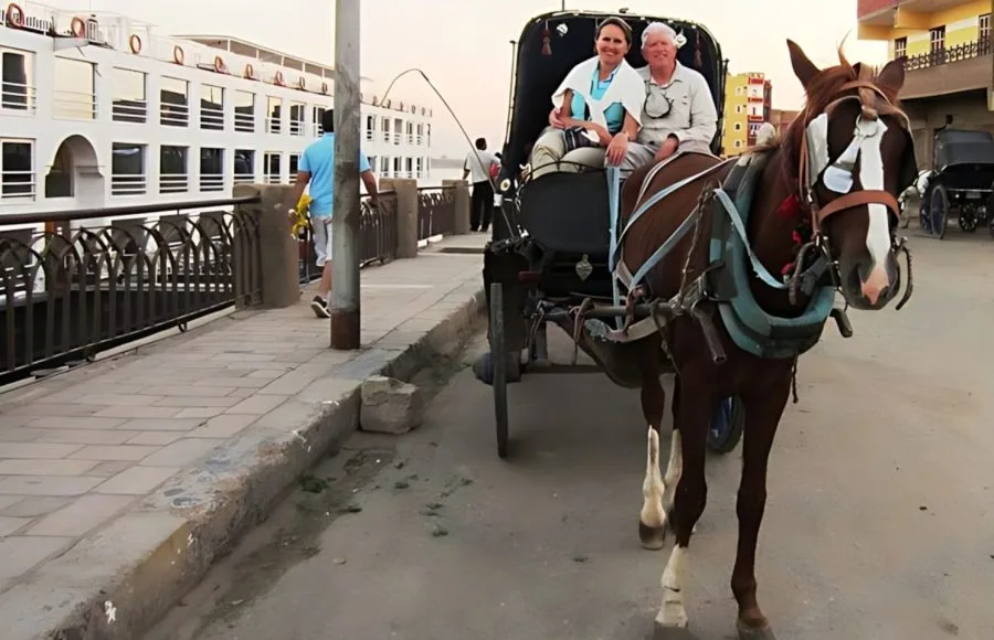 Tourists-Taking-a-photo-in-Aswan-on-Horse-Carriage