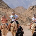 Tourists-enjoy-the-camel-safari-in-the-desert-near-Hurghada-Egypt