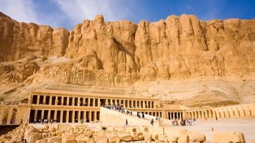 Queen Hatshepsut Temple nestled dramatically beneath cliffs near the Valley of the Kings