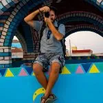 A-young-tourist-sitting-on-a-beautiful-terrace-in-a-Nubian-village