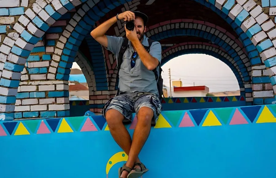 A-young-tourist-sitting-on-a-beautiful-terrace-in-a-Nubian-village