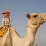 Child-Riding-Camel-In-The-Marsa-Alam-Desert