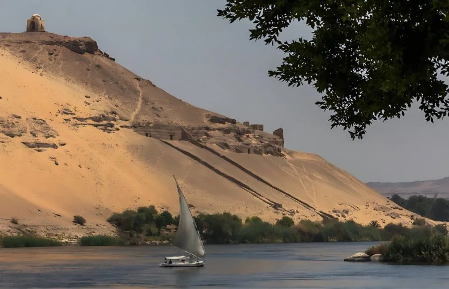 Felucca-On-The-Nile-In-Front-Of-The-Tombs-Of-The-Nobles