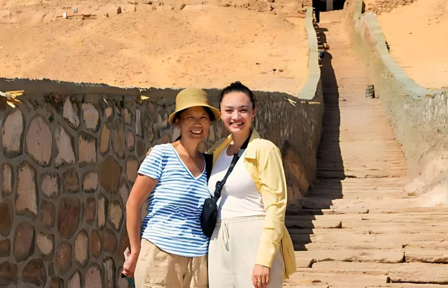 Female-tourists-ascending-to-the-tombs-of-the-Nobles-in Aswan