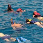 Group-of-tourists-snorkeling-and-scuba-diving-in-Giftun-island-in-Red-Sea-Hurghada