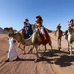 Tourists-riding-camels-in-the-Egypt-desert