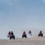 Friends-Driving-Quad-Bikes-During-Safari-Trip-In-Makadi-Bay-Desert