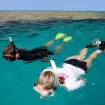 Man-Woman-snorkeling-Coral-Reef-Red-Sea-safaga