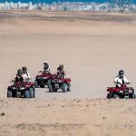 People-Driving-Quad-Bikes-During-Safari-Tour-In-Makadi-Bay-Desert
