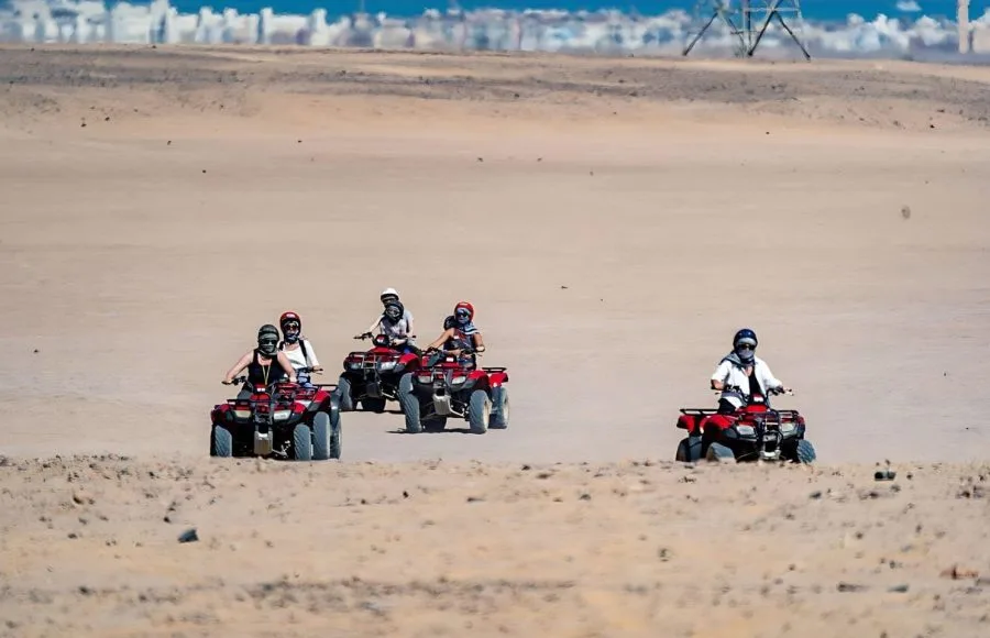 People-Driving-Quad-Bikes-During-Safari-Tour-In-Makadi-Bay-Desert