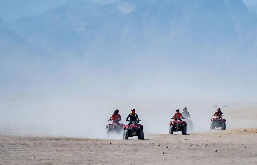 People-Driving-Quad-Bikes-During-Safari-Trip-In-Makadi-Bay-Desert