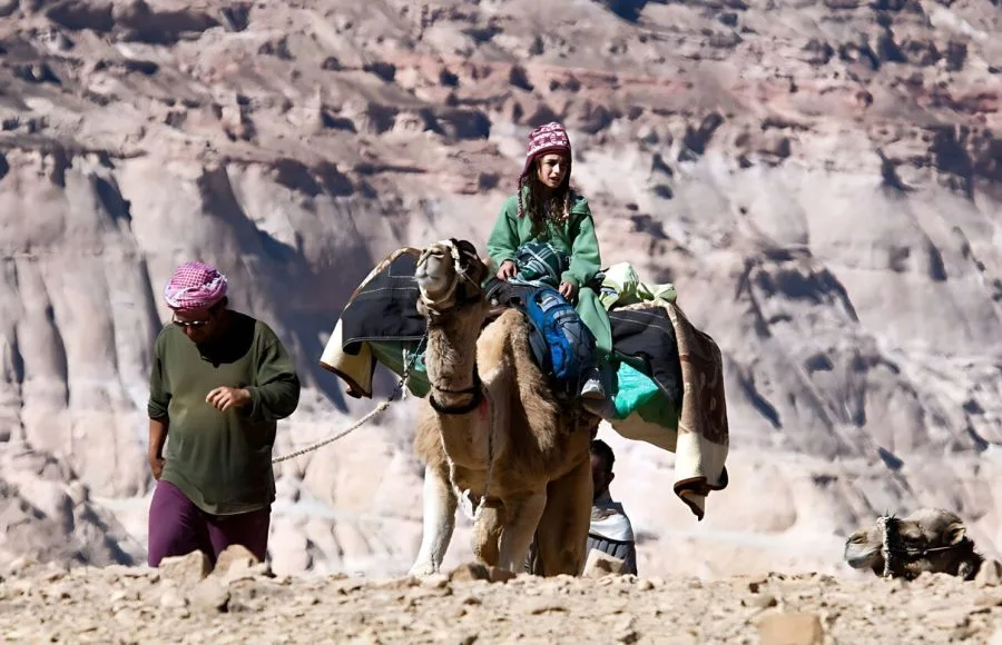 Young-Girl-Riding-Camel-At-Camel-Safari-In-The-Sinai-Desert-Egypt