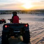 Young-man-in-safari-trip-through-egyptian-desert-soma-Bay-Hurghada