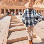 Tourist ascending the steps of the Temple of Hatshepsut a highlight of the 3 Day Upper Egypt Short Break Tour