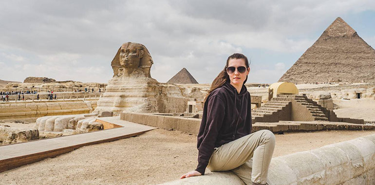 A Stylish Woman Against The Background Of The Great Giza Pyramid