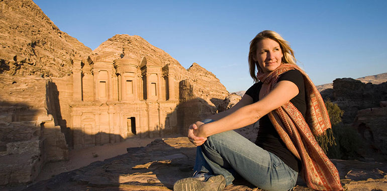 A Tourist Visits The Nabatean Ruins Of The Monastery At Petra