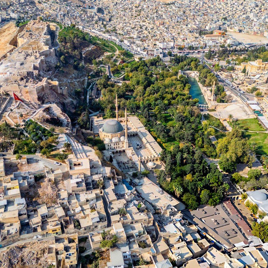 Aerial overview Sanliurfa city Urfa Castle Balikligol mosque park