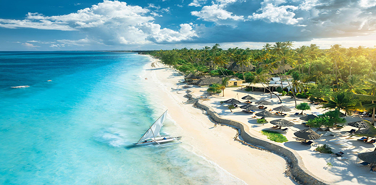 Aerial view of the sailboat on blue sea in Zanzibar
