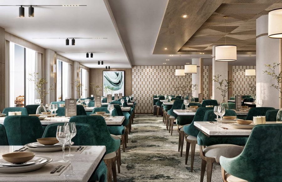 Modern cruise ship restaurant with marble tables, teal velvet chairs, and a buffet area.