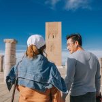 Asian-Chinese-female-tourist-exploring-at-the-Hassan-Tower-Rabat-Morocco