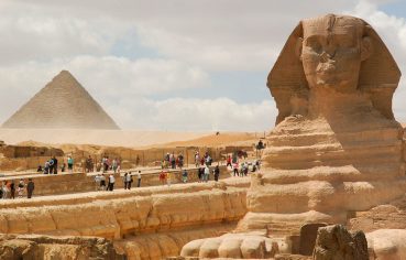 The majestic Sphinx guards the Cairo pyramids as part of an unforgettable Cairo and Aswan Tour