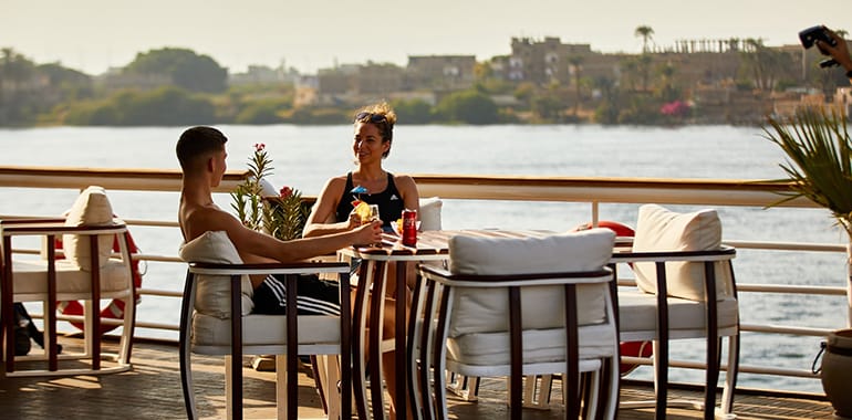 Couple Enjoying Nile Cruise Deck Drinks
