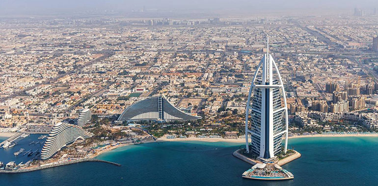 Burj Al Arab luxury hotel aerial view aerial view by the sea from above in Dubai United Arab Emirates