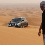 Dubai-desert-safari-in-sunset-light-Off-road-safari-in-sand-desert-Empty-Quarter-Desert-in-United-Arab-Emirates