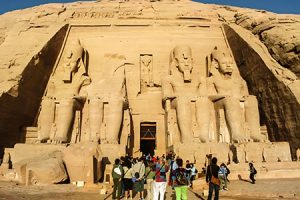 Tourists visited Abu Simbel Temple, a highlight of Egypt Holiday Packages From Melbourne. Tourists gathered in front of the Abu Simbel Temple, a major attraction in Egypt vacation packages from Melbourne.