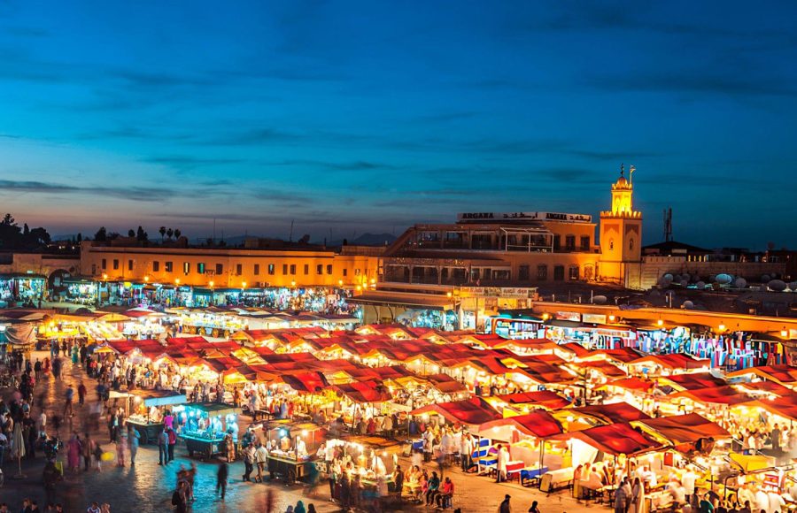 Evening-Djemaa-El-Fna-Square-with-Koutoubia-Mosque-Marrakech-Morocco