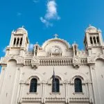 Grand facade of the Greek Orthodox Church of Alexandria, Egypt, a stop on the Holy Family Tour.