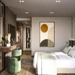 A sleek, modern reception desk on a Nile cruise ship, featuring a long, light wood paneled front and a grey marble countertop. Behind the desk, a dark, reflective glass wall displays three analog clocks showing different time zones. To the left, large windows with blue-grey curtains offer a bright view of the water and shore outside. The floor is light grey marble, and the space is lit by black track lighting.