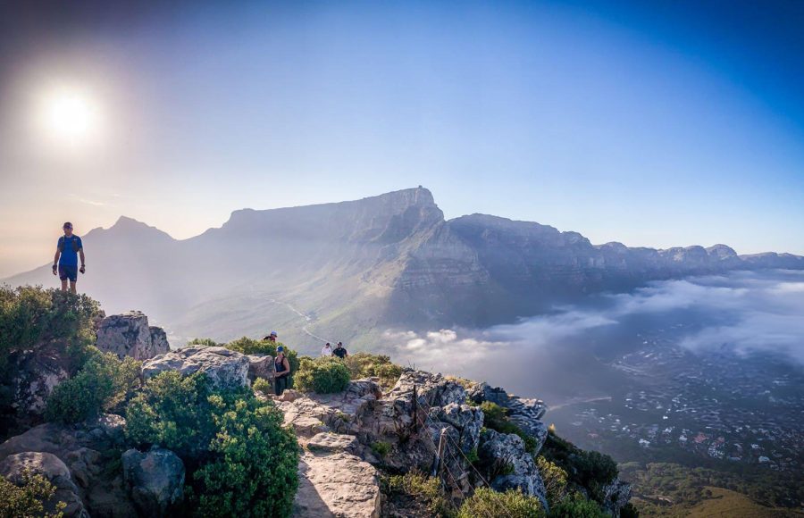 Hikers-on-Lion-Head-Overlooking-Table-Mountain-in-Cape-Town