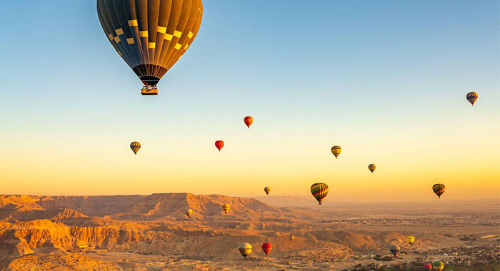 Hot Air Balloons Over Temple Of Hatshepsut At Deir El Bahari And Valley Of Kings Near Luxor Egpyt