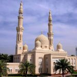 Jumeirah-Mosque-in-Dubai-showcasing-elegant-Islamic-architecture-twin-minarets-detailed-stone-design
