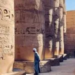 Two colossal standing statues of a pharaoh at Karnak Temple