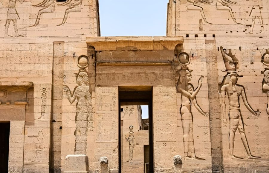 Pylon entrance of the Philae Temple with large carved deities