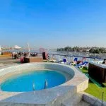 Circular jacuzzi and square hot tub on the ship's sundeck.
