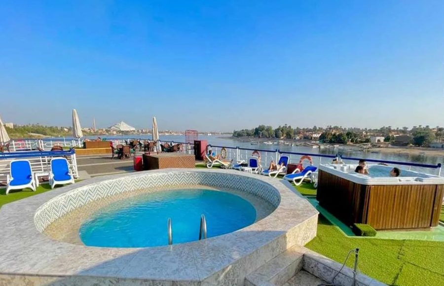 Circular jacuzzi and square hot tub on the ship's sundeck.