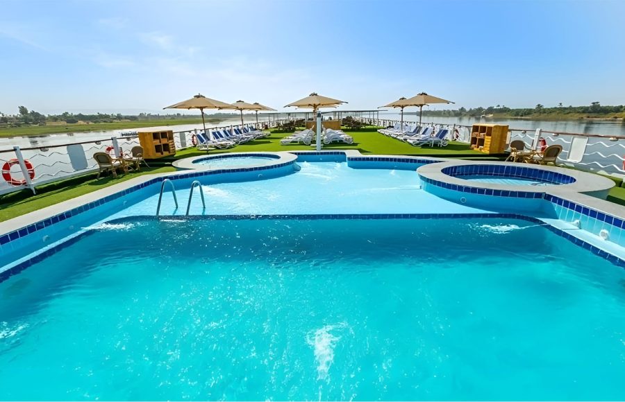 Cruise ship sundeck with pool and loungers