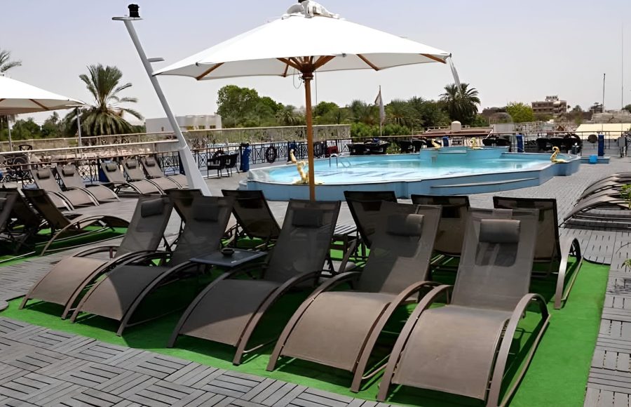 Sundeck of the MS Emilio Nile Cruise ship with swimming pool and lounge chairs.