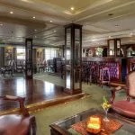 The sophisticated lounge and bar area on the La Traviata Nile Cruise is perfect for evening relaxation.