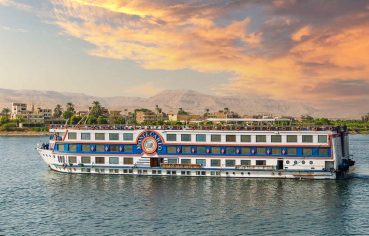 Nile Cruise sundeck with rows of lounge chairs and turf.