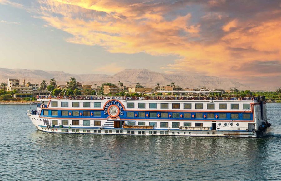 Nile Cruise sundeck with rows of lounge chairs and turf.