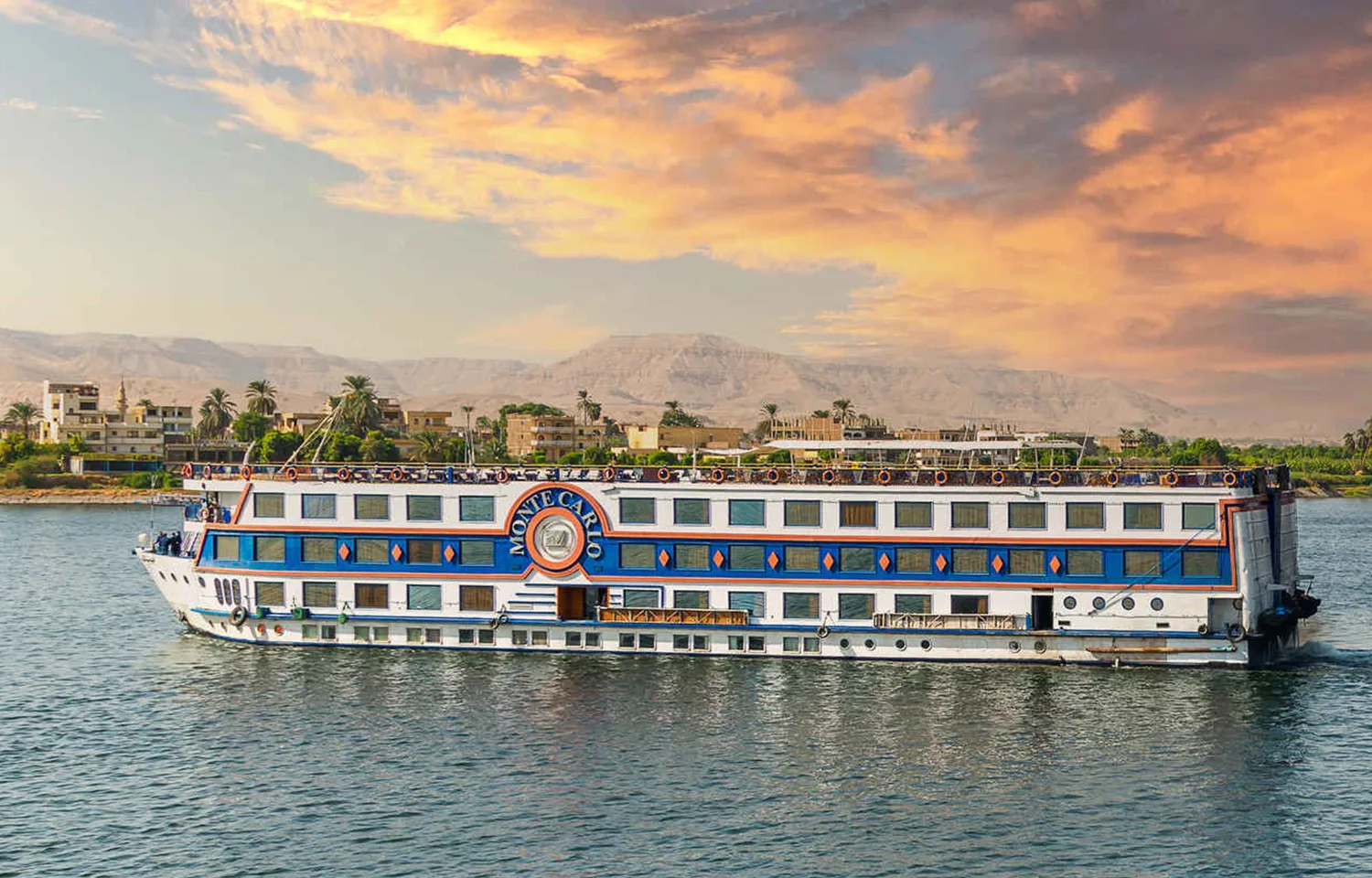 Nile Cruise sundeck with rows of lounge chairs and turf.