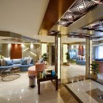 The elegant and luxurious lobby aboard the MS Nile Treasure Cruise, featuring modern seating, polished marble floors, and sophisticated decorative lighting.