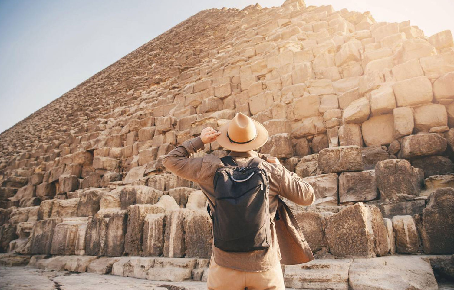 Man Tourist Walks Background Of Pyramids In Giza Cairo Egypt