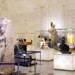 Artifacts and visitors inside the Museum of Egyptian Civilization enjoying a Museum of Egyptian Civilization tour