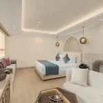 Bright Nile cruise dining room with light pink chairs and decorative wall.